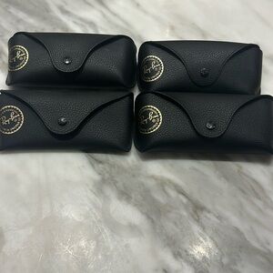 Different size Ray-Ban sunglass cases